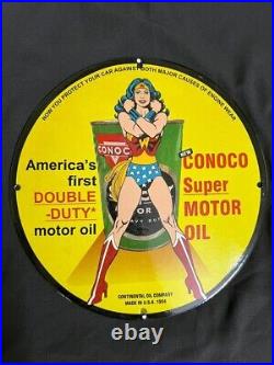 1954 Conoco Super Motors Oil Wonder Women Porcelain Enamel Pinup Sign